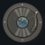 Reloj de pared de registro de vinilo vintage<br><div class="desc">Una creación completa de una fototienda, este viejo disco de vinilo LP en una mesa redonda es ideal para aquellos que aprecian los sonidos de los jugadores de discos de antaño. Este divertido reloj de diseño de álbum vintage hará un gran regalo para cualquiera de cualquier edad, músicos, coleccionistas de...</div>