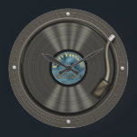 Reloj de pared de registro de vinilo vintage<br><div class="desc">Una creación completa de una fototienda, este viejo disco de vinilo LP en una mesa redonda es ideal para aquellos que aprecian los sonidos de los jugadores de discos de antaño. Este divertido reloj de diseño de álbum vintage hará un gran regalo para cualquiera de cualquier edad, músicos, coleccionistas de...</div>