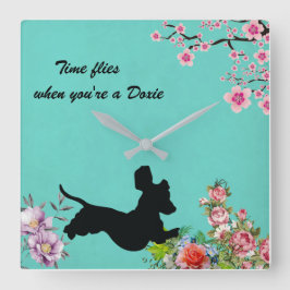 Reloj de pared de silueta azul turquesa floral Dac