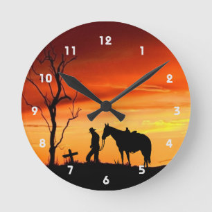 Reloj de pared de silueta de la oración de Cowboy