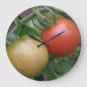 Reloj de pared de tomates naranjas y rojos