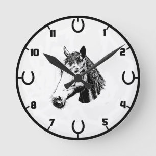 Reloj de pared del caballo y de la herradura