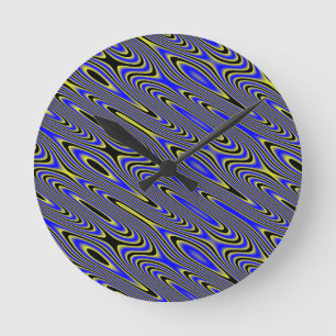 Reloj de pared del patrón giratorio amarillo y azu