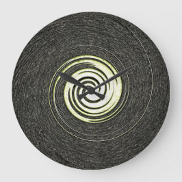 Reloj de pared en negro y oro abstracto