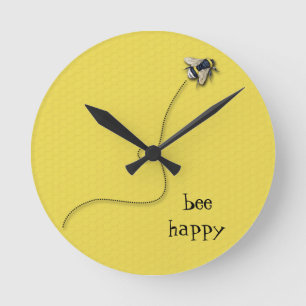 Reloj de pared feliz de la abeja del amarillo de