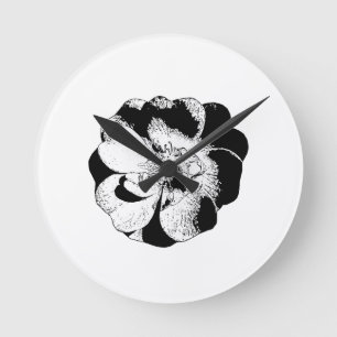 Reloj de pared floral minimalista en blanco y negr