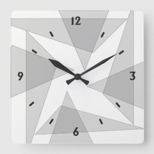 Reloj de pared geométrico gris