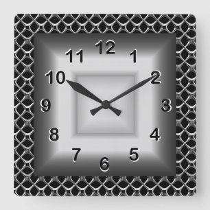 Reloj de pared gris aspecto metal negro plateado