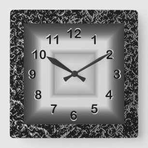 Reloj de pared gris aspecto metálico negro platead