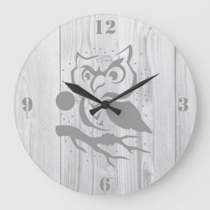 Reloj de pared gris del búho