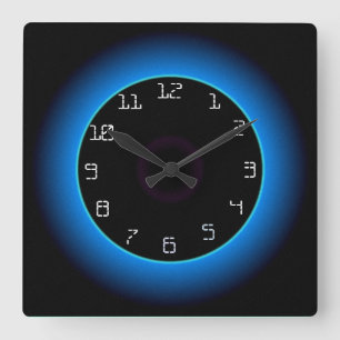 Reloj de pared iluminado azul/agua sobre negro