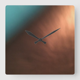 Reloj de pared marrón y turquesa de cobre