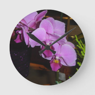 Reloj de pared púrpura de la orquídea