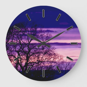 Reloj de pared púrpura de la silueta del árbol de