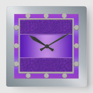 Reloj de pared púrpura y de plata