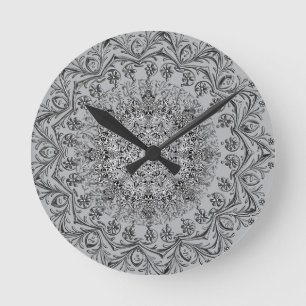 Reloj de pared redondo con elegante patrón de mand