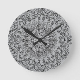 Reloj de pared redondo con elegante patrón de mand