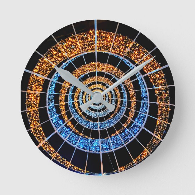 Reloj de pared redondo con luces centelleantes en  (Anverso)