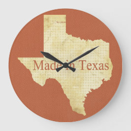 Reloj de pared rojizo y crema en el mapa del estad