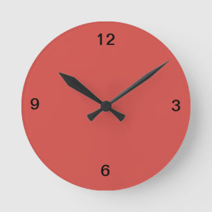Reloj de pared rojo de Pimienta