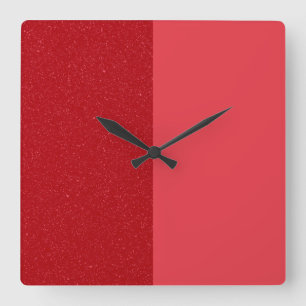Reloj de pared rojo de tomate con división persona