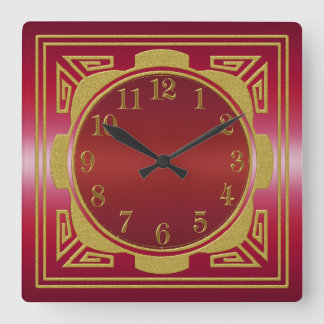 Reloj de pared rojo y dorado