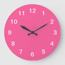Reloj de pared rosa caliente minimalista elegante