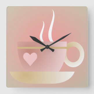 Reloj de pared rosado de la taza de té y del