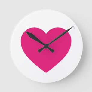 Reloj de pared rosado del corazón
