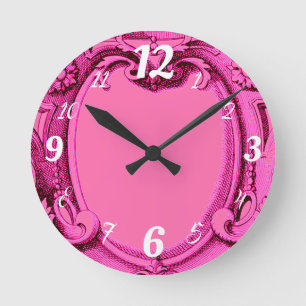 Reloj de pared rosado del marco vintage