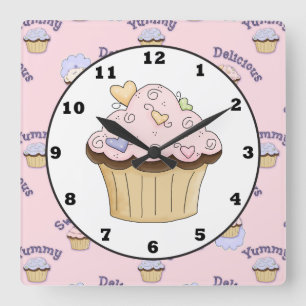 Reloj de pared rosado delicioso de la cocina de la