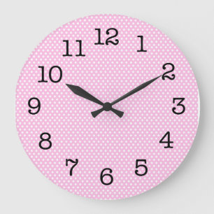 Reloj de pared rosado simple del lunar