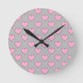 Reloj de pared rosado y gris del modelo del