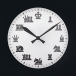 Reloj de pared temática del ajedrez<br><div class="desc">Este reloj de pared único está especialmente diseñado para los amantes del ajedrez y para los jugadores de Chess.com. Con un diseño limpio en blanco y negro con elegantes piezas de ajedrez en lugar de números, aporta estilo y estrategia a tu hogar. Perfecto para su sala de juegos, estudio u...</div>
