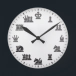 Reloj de pared temática del ajedrez<br><div class="desc">Este reloj de pared único está especialmente diseñado para los amantes del ajedrez y para los jugadores de Chess.com. Con un diseño limpio en blanco y negro con elegantes piezas de ajedrez en lugar de números, aporta estilo y estrategia a tu hogar. Perfecto para su sala de juegos, estudio u...</div>