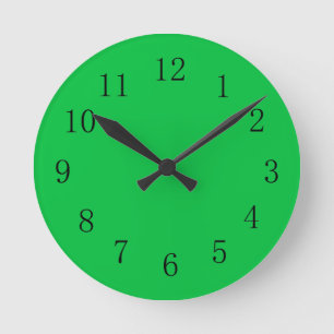 Reloj de pared verde alegre y brillante