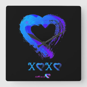 Reloj de pared XOXO del corazón azul