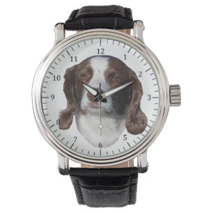 Reloj de perro marrón y blanco