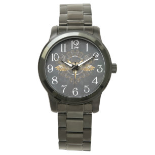 Reloj De Pulsera Cráneo de pájaro dorado sobre fondo negro