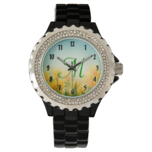 Reloj de pulsera de tulipanes amarillos besados po