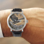 Reloj De Pulsera Eagle Soaring Watch<br><div class="desc">Abraza a la Majestad del Tiempo con nuestro reloj de pulsera de águila. Este exquisito reloj captura la esencia de la libertad y el honor, con un águila majestuoso en vuelo contra un telón de fondo de cielos dorados. Es un símbolo de fuerza y gracia, un perfecto tributo al espíritu...</div>