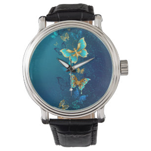 Reloj De Pulsera Mariposas doradas sobre fondo azul