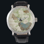 Reloj De Pulsera Mariposas en la música de hojas con diseño floral<br><div class="desc">Un diseño floral verde y una partitura de papel sirven como telón de fondo de un trío de mariposas en esta pieza de Vision Studio. La palabra francesa para mariposa, papillon, también está estampada al final de la pieza. Si te gustan mucho las mariposas, la naturaleza, o como si te...</div>