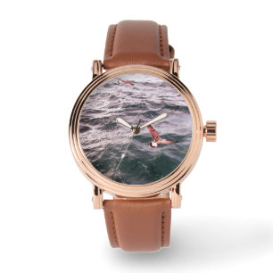 RELOJ DE PULSERA MARISCOS VOLANDO POR LAS OLAS DEL MAR
