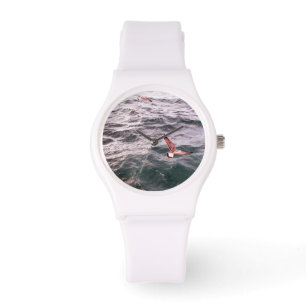 RELOJ DE PULSERA MARISCOS VOLANDO POR LAS OLAS DEL MAR