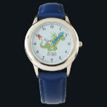 Reloj De Pulsera Niños adorables Personalizados de Dragón Verde y n<br><div class="desc">Este lindo reloj azul y moderno para niños presenta un adorable dragón verde y tiene espacio para que le agregues el nombre de tus hijos. Con números claros y fácilmente legibles, este 'primer' reloj es genial para niños o niños recién empezando a aprender el tiempo. ¡El diseño de temática dragón...</div>