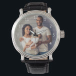 Reloj De Pulsera Números blancos de foto de familia personalizado<br><div class="desc">Convierte una foto familiar en un tesoro conservador que pueda usar todos los días. Este reloj muestra simples números sans serif blancos alrededor del espacio para tu fotografía favorita. Reemplace fácilmente la imagen de ejemplo con la suya propia.</div>