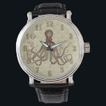 Reloj De Pulsera Octopus marrón vintage con anclas<br><div class="desc">Este bonito y antiguo dibujo de pulpo* del siglo XIX ha sido coloreado marrón y colocado sobre un fondo marrón claro bonito - beige angustiado / gris con un patrón de ancla débil. El resultado es un reloj original que se adapta a tu temática náutica y playera o al steampunk....</div>