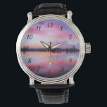 Reloj De Pulsera Paisaje rosa escénico<br><div class="desc">Hermosa puesta de sol rosa sobre un tranquilo lago con una hilera de árboles al fondo. Una mezcla y mezcla de nubes coloridas con tonos rosas,  azules,  morados y amarillos. Iluminación impresionante y húmeda,  sombras y reflexiones.</div>