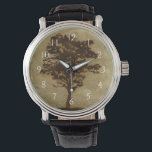 Reloj De Pulsera Silueta de árbol sobre fondo de bronce<br><div class="desc">Un fondo de bronce es el escenario de esta silueta de un árbol con ramas que oscilan en la brisa. Casi sientes como si pudieras descansar tu espalda contra este árbol,  sentarte en el suelo y tomar una larga siesta.</div>